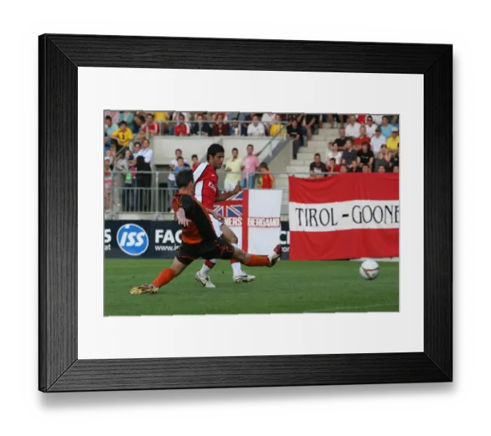 Framed Print : Carlos Vela shoots past Burgenland goalkeeper Johannes