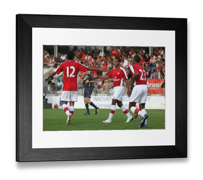 Framed Print : Carlos Vela celebrates his 2nd goal iwth Theo Walcott and Jay Simpson
