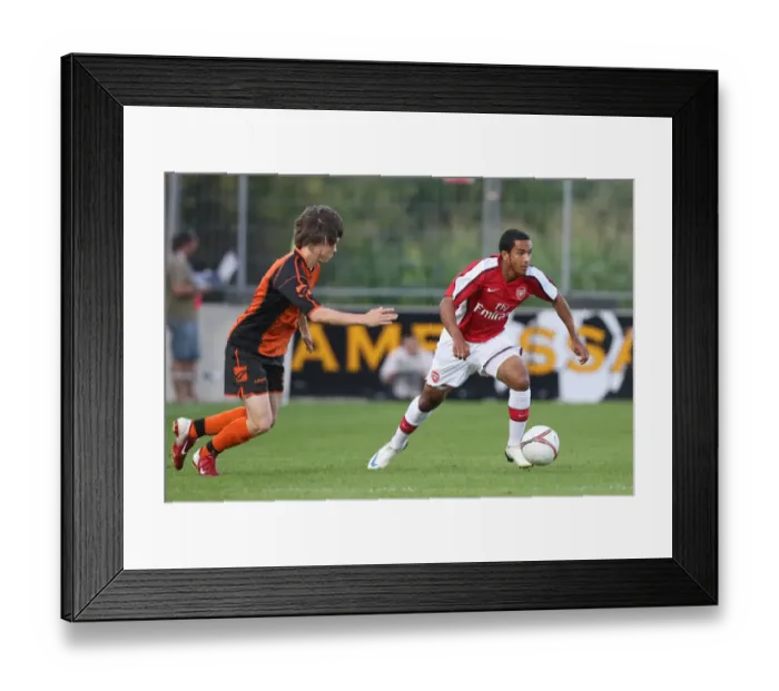 Framed Print : Theo Walcott (Arsenal) Michael Artner (Burgenland)
