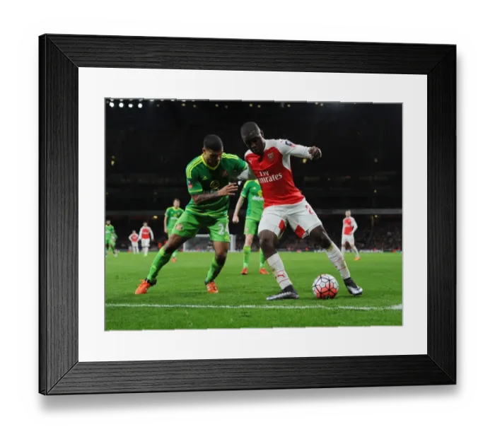 Framed Print : Arsenal vs Sunderland: FA Cup Showdown - Campbell vs Yedlin at Emirates Stadium