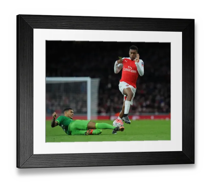 Framed Print : Arsenal's Iwobi Clashes with Sunderland's Yedlin in FA Cup Battle at The Emirates Framed Print : Arsenal's Iwobi Clashes with Sunderland's Yedlin in FA Cup Battle at The Emirates