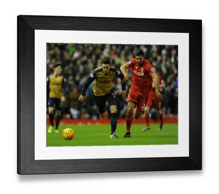 Framed Print : Mesut Ozil vs. Emre Can: A Premier League Showdown at Anfield, 2015-16 Framed Print : Mesut Ozil vs. Emre Can: A Premier League Showdown at Anfield, 2015-16