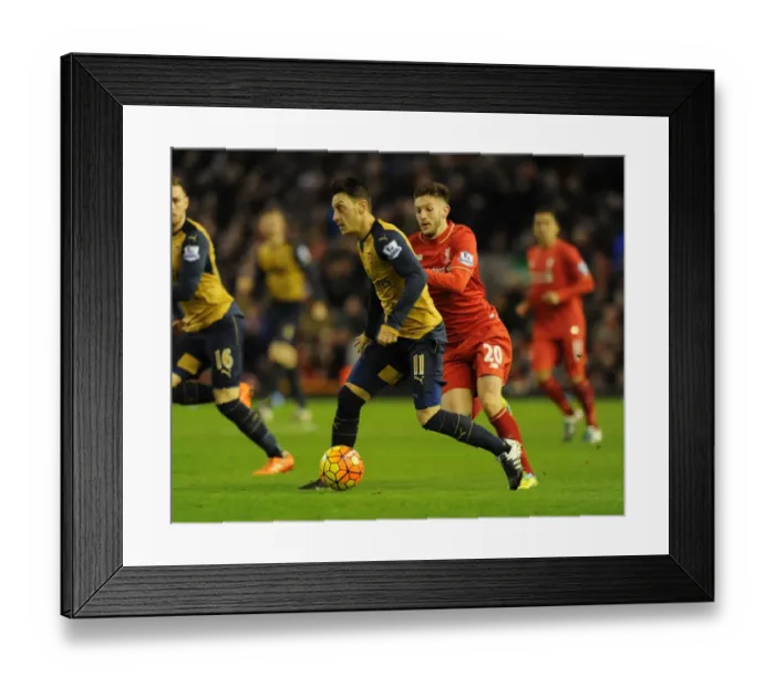 Framed Print : Mesut Ozil Outmaneuvers Adam Lallana: Premier League Showdown between Liverpool and Arsenal (2015-16) Framed Print : Mesut Ozil Outmaneuvers Adam Lallana: Premier League Showdown between Liverpool and Arsenal (2015-16)