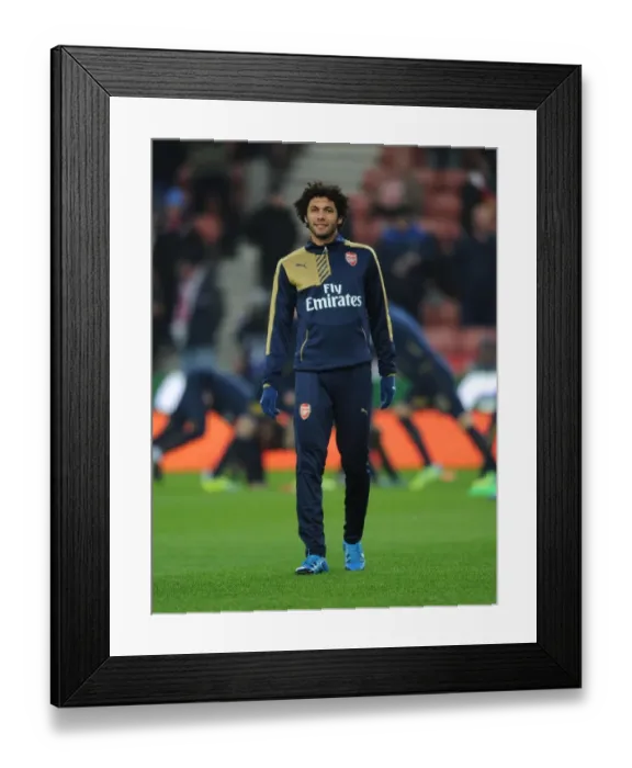 Framed Print : Mohamed Elneny Gears Up: Arsenal's Midfield Maestro Prepares for Stoke City Showdown (2015-16) Framed Print : Mohamed Elneny Gears Up: Arsenal's Midfield Maestro Prepares for Stoke City Showdown (2015-16)