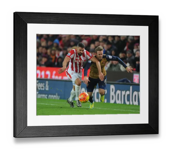 Framed Print : Intense Battle: Nacho Monreal vs. Jonathan Walters at Stoke City vs. Arsenal (Premier League, 2015-16) Framed Print : Intense Battle: Nacho Monreal vs. Jonathan Walters at Stoke City vs. Arsenal (Premier League, 2015-16)