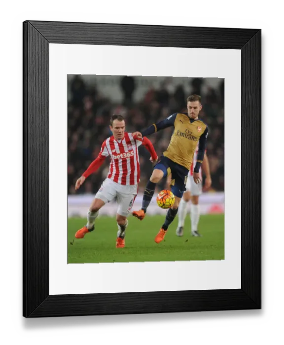 Framed Print : Intense Rivalry: Ramsey vs. Whelan at The Britania Stadium - Arsenal vs. Stoke City, Premier League, 2016