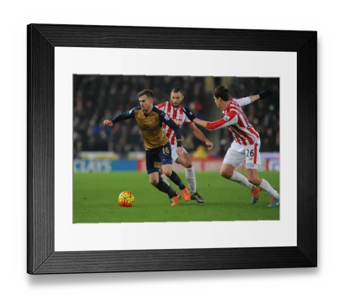 Framed Print : Aaron Ramsey Scores Past Stoke's Jakob Haugaard: Arsenal's Thrilling Goal in the Premier League 2015-16 Match Against Stoke City Framed Print : Aaron Ramsey Scores Past Stoke's Jakob Haugaard: Arsenal's Thrilling Goal in the Premier League 2015-16 Match Against Stoke City