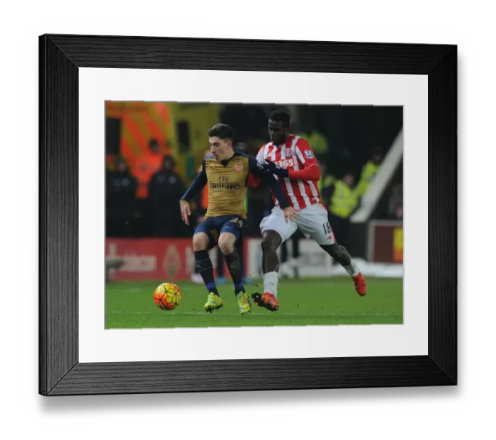 Framed Print : Intense Battle: Hector Bellerin vs Mame Diouf at Stoke City vs Arsenal (Premier League 2015-16) Framed Print : Intense Battle: Hector Bellerin vs Mame Diouf at Stoke City vs Arsenal (Premier League 2015-16)