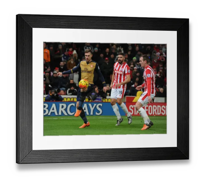 Framed Print : Ramsey in Action: Arsenal vs Stoke City, Premier League 2015-16