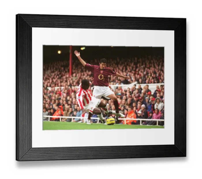 Framed Print : Jose Reyes (Arsenal) Nyron Nosworthy (Sunderland). Arsenal 3: 1 Sunderland