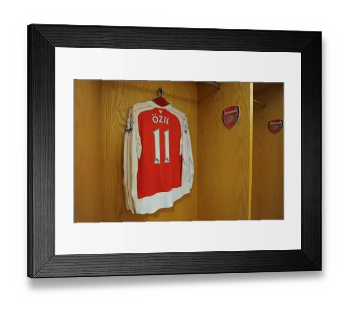 Framed Print : Mesut Ozil's Absence: Empty Hanger in Arsenal Changing Room During Arsenal vs Chelsea (2015-16)