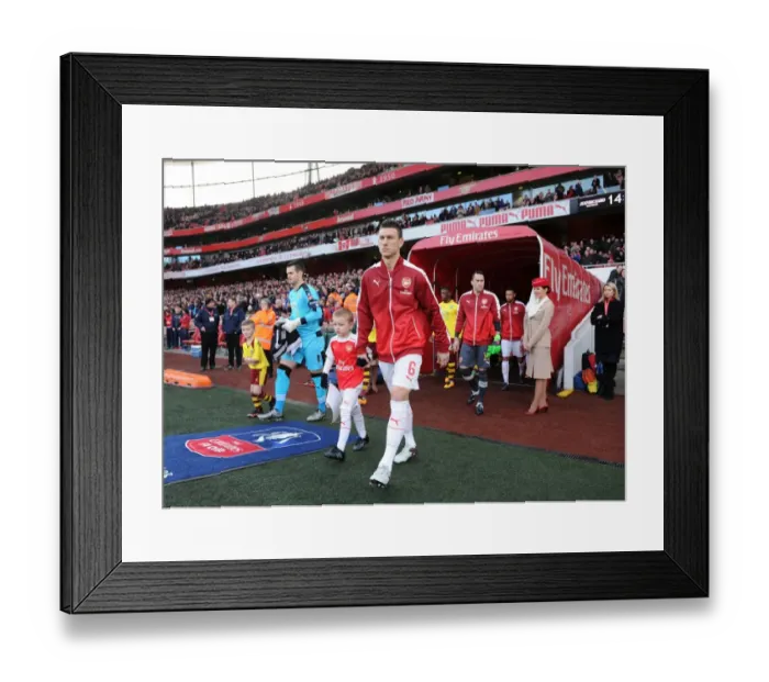 Framed Print : Arsenal's Laurent Koscielny Leads Team Out Against Burnley in FA Cup Fourth Round