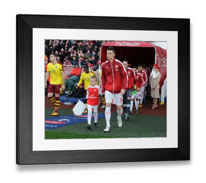 Framed Print : Arsenal's Koscielny and the Mascot: FA Cup Showdown at The Emirates, 2016 Framed Print : Arsenal's Koscielny and the Mascot: FA Cup Showdown at The Emirates, 2016