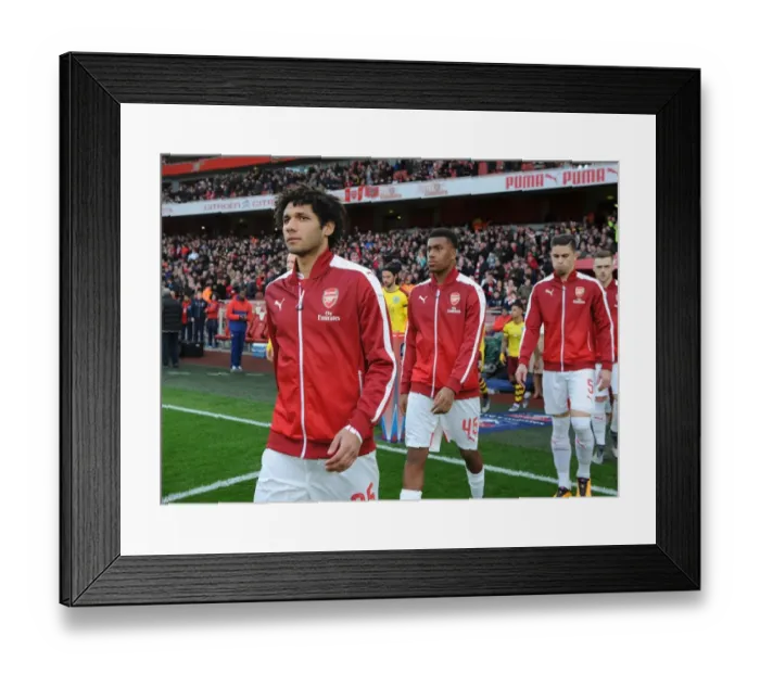 Framed Print : Arsenal's Mohamed Elneny Gears Up for FA Cup Battle Against Burnley Framed Print : Arsenal's Mohamed Elneny Gears Up for FA Cup Battle Against Burnley