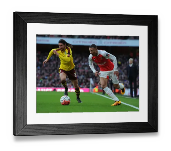 Framed Print : Arsenal's Kieran Gibbs Outruns Burnley's George Boyd in FA Cup Fourth Round Clash