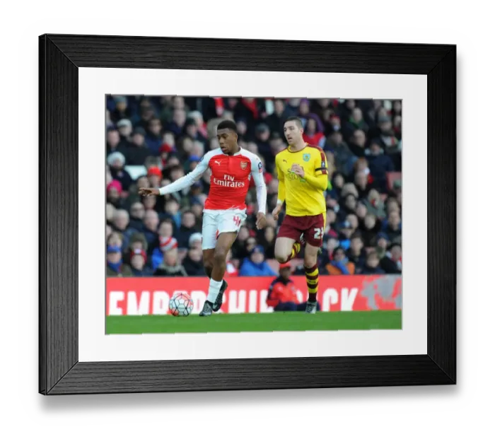 Framed Print : Alex Iwobi Outmaneuvers Stephen Ward in FA Cup Showdown