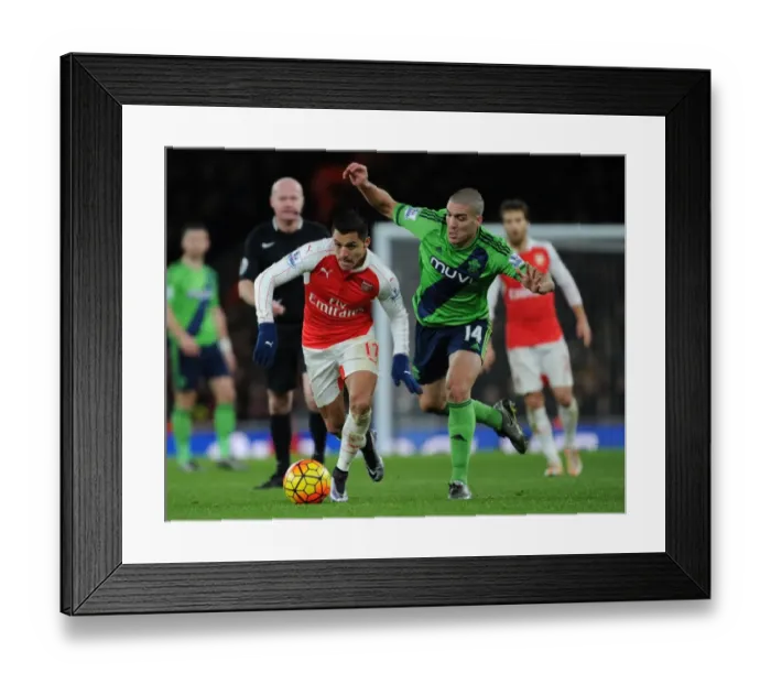 Framed Print : Alexis Sanchez Outsmarts Oriol Romeu: Arsenal vs Southampton, 2015-16 Premier League Framed Print : Alexis Sanchez Outsmarts Oriol Romeu: Arsenal vs Southampton, 2015-16 Premier League