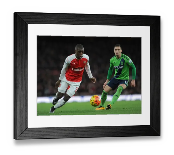 Framed Print : Campbell vs Tadic: A Premier League Battle at Emirates Stadium