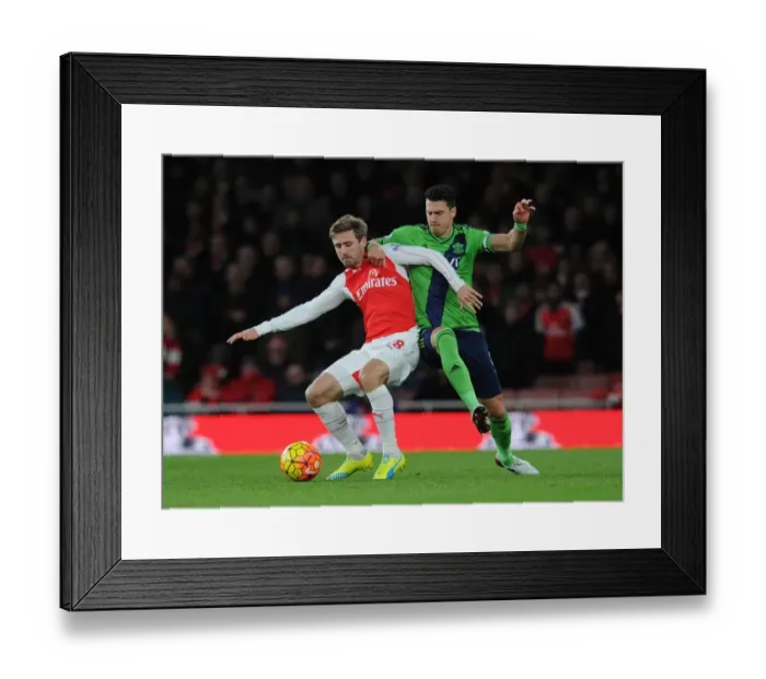 Framed Print : Intense Face-off: Monreal vs Fonte, Arsenal vs Southampton, Premier League 2015-16