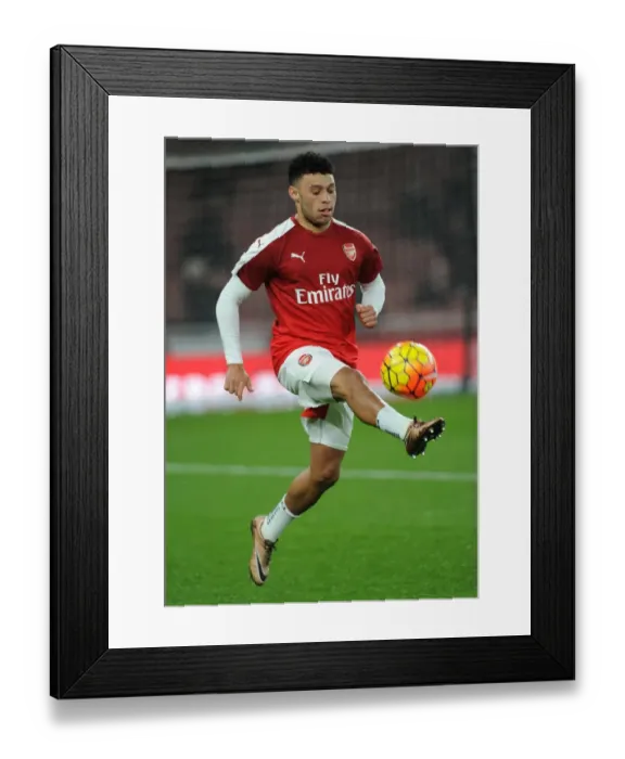 Framed Print : Gearing Up: Oxlade-Chamberlain's Pre-Match Routine at Emirates Stadium - Arsenal vs Southampton, Barclays Premier League Framed Print : Gearing Up: Oxlade-Chamberlain's Pre-Match Routine at Emirates Stadium - Arsenal vs Southampton, Barclays Premier League