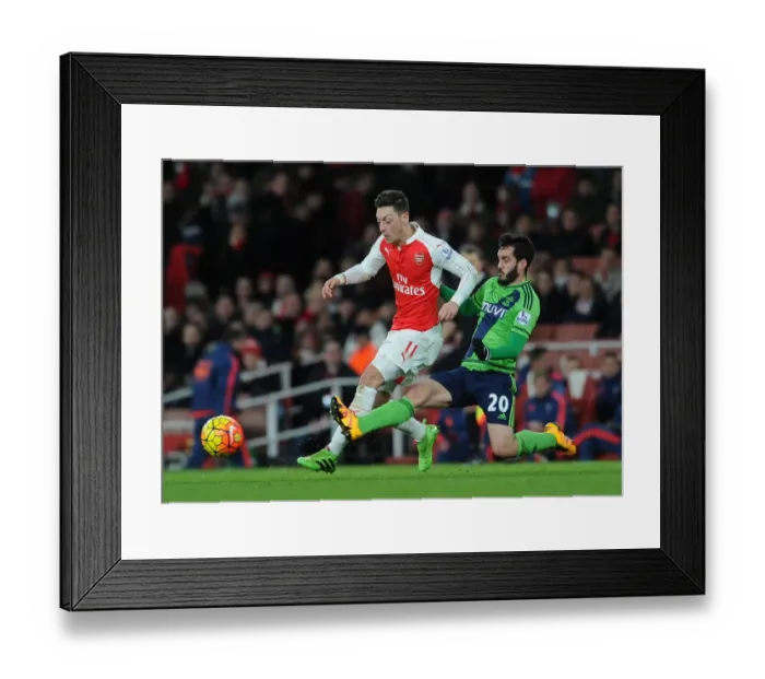 Framed Print : Intense Clash: Ozil vs Juanmi at Emirates Stadium - Arsenal vs Southampton, Premier League 2015-16