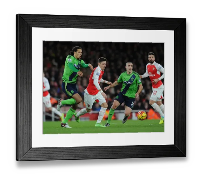 Framed Print : Mesut Ozil vs. Virgil van Dijk and Oriol Romeu: A Battle of Midfield Masters at the Emirates (2015-16) Framed Print : Mesut Ozil vs. Virgil van Dijk and Oriol Romeu: A Battle of Midfield Masters at the Emirates (2015-16)