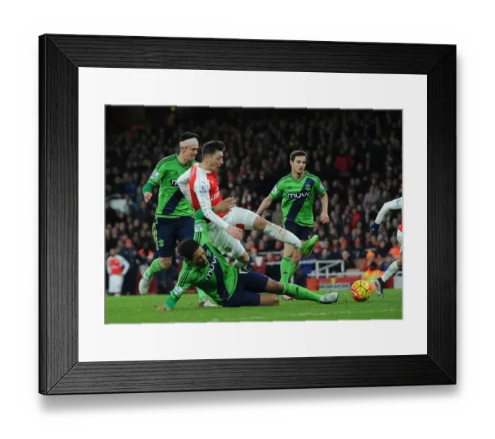 Framed Print : Mesut Ozil vs. Victor van Dijk: A Footballing Battle at Emirates Stadium (Arsenal vs. Southampton, 2015-16)