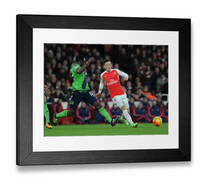 Framed Print : Mesut Ozil Dodges Victor Wanyama: Thrilling Moment from Arsenal vs Southampton (2015-16) Framed Print : Mesut Ozil Dodges Victor Wanyama: Thrilling Moment from Arsenal vs Southampton (2015-16)