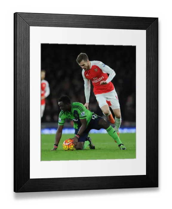 Framed Print : Intense Battle: Ramsey vs. Wanyama - Arsenal's Midfield Tussle against Southampton Framed Print : Intense Battle: Ramsey vs. Wanyama - Arsenal's Midfield Tussle against Southampton