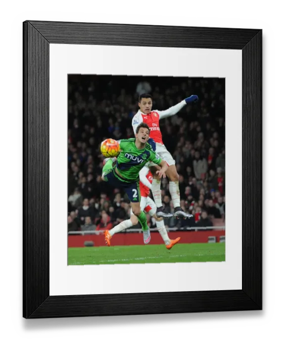Framed Print : Clash at Emirates: Sanchez vs. Soares - A Head-to-Head Battle