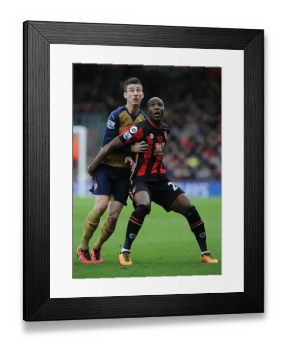 Framed Print : Intense Battle: Laurent Koscielny vs Benik Afobe at Bournemouth's The Vitality Stadium (Arsenal vs Bournemouth 2015-16) Framed Print : Intense Battle: Laurent Koscielny vs Benik Afobe at Bournemouth's The Vitality Stadium (Arsenal vs Bournemouth 2015-16)