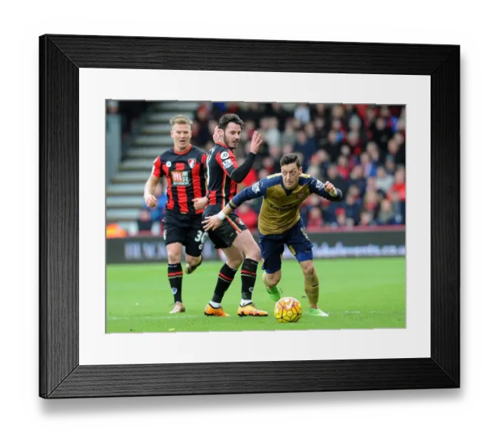 Framed Print : Mesut Ozil vs. Adam Smith: A Midfield Battle at The Vitality Stadium, Premier League 2015-16 Framed Print : Mesut Ozil vs. Adam Smith: A Midfield Battle at The Vitality Stadium, Premier League 2015-16