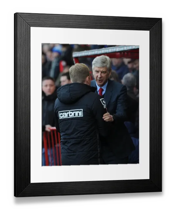 Framed Print : Arsene Wenger and Eddie Howe: A Pre-Match Handshake at the Bournemouth vs. Arsenal Premier League Match, 2016