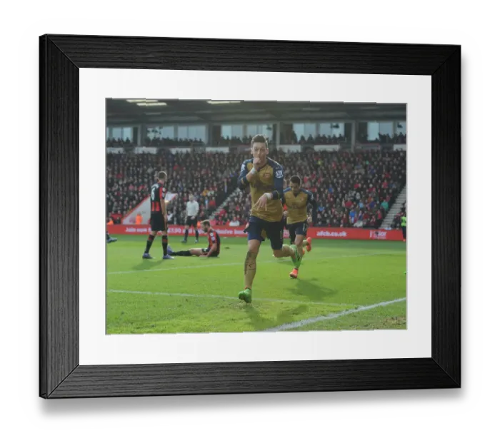 Framed Print : Mesut Ozil Scores First Goal: Arsenal's Triumph at Bournemouth (2015-16) Framed Print : Mesut Ozil Scores First Goal: Arsenal's Triumph at Bournemouth (2015-16)