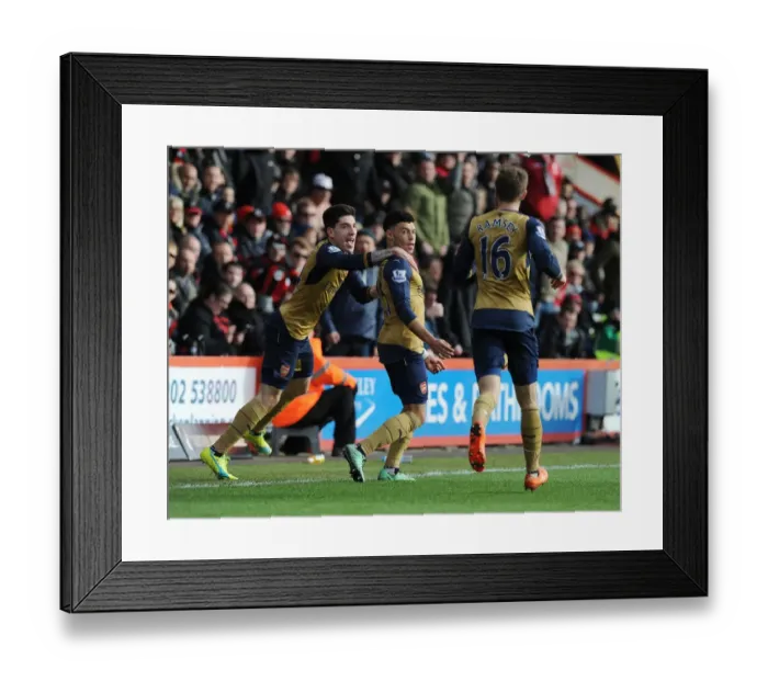 Framed Print : Oxlade-Chamberlain's Brace: Arsenal Triumphs Over Bournemouth in Premier League 2015-16