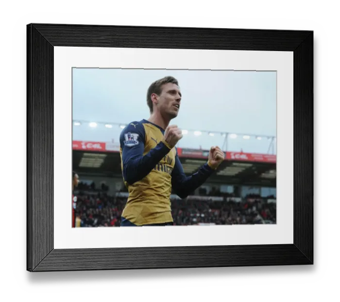 Framed Print : Arsenal Clinch Premier League Victory: Monreal's Goal Against Bournemouth Secures Title Triumph