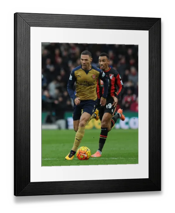 Framed Print : Arsenal's Kieran Gibbs Outsmarts Junior Stanislas in Premier League Showdown Framed Print : Arsenal's Kieran Gibbs Outsmarts Junior Stanislas in Premier League Showdown
