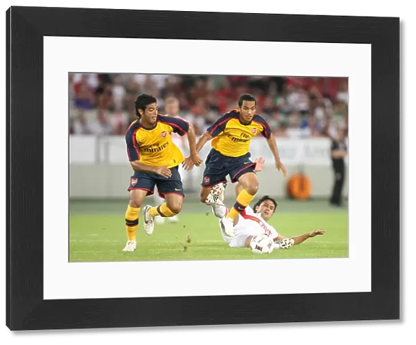 Theo Walcott and Carlos Vela (Arsenal) Tasci (Stuttgart)