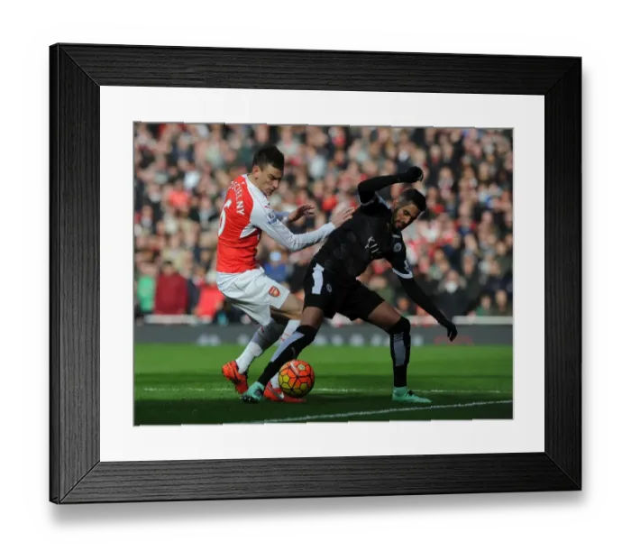 Framed Print : Intense Battle: Koscielny vs Mahrez - Arsenal vs Leicester City, Premier League Clash Framed Print : Intense Battle: Koscielny vs Mahrez - Arsenal vs Leicester City, Premier League Clash