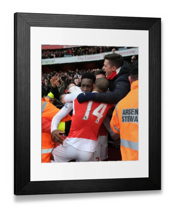 Framed Print : Arsenal's Danny Welbeck Scores Second Goal Against Leicester City in Premier League 2015-16: Celebrating with Theo Walcott and Fans Framed Print : Arsenal's Danny Welbeck Scores Second Goal Against Leicester City in Premier League 2015-16: Celebrating with Theo Walcott and Fans