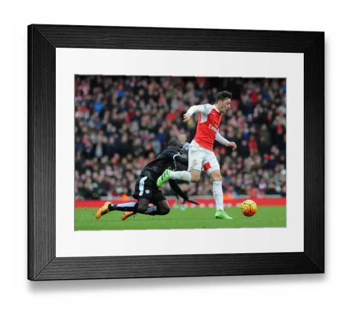 Framed Print : Mesut Ozil vs N'Golo Kante: A Midfield Showdown in Arsenal vs Leicester City Premier League Clash Framed Print : Mesut Ozil vs N'Golo Kante: A Midfield Showdown in Arsenal vs Leicester City Premier League Clash
