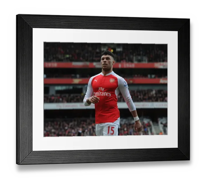 Framed Print : Arsenal's Oxlade-Chamberlain Faces Off Against Leicester City in Premier League Clash