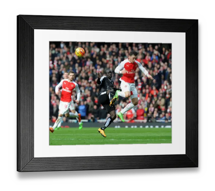 Framed Print : Ozil vs Kante: Premier League Showdown - Arsenal vs Leicester City (February 2016)