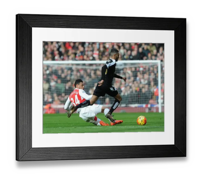 Framed Print : Intense Battle: Coquelin Stops Mahrez in Arsenal vs Leicester Premier League Clash