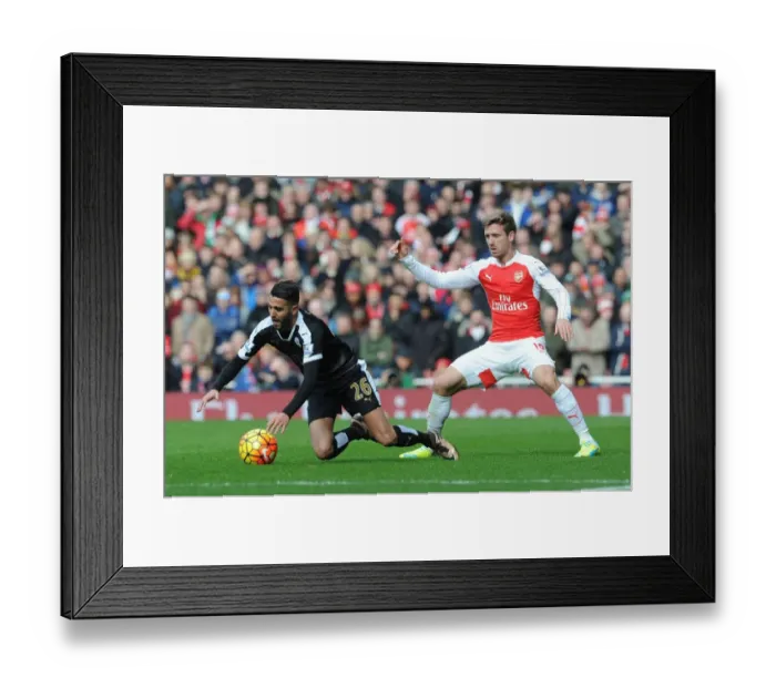 Framed Print : Intense Battle: Monreal vs Mahrez - Arsenal vs Leicester City Football Rivalry Framed Print : Intense Battle: Monreal vs Mahrez - Arsenal vs Leicester City Football Rivalry