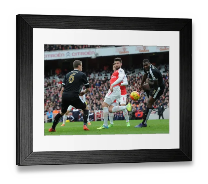 Framed Print : Olivier Giroud (Arsenal) heads the ball between Robert Huth and Wes Morgan (Leicester) Framed Print : Olivier Giroud (Arsenal) heads the ball between Robert Huth and Wes Morgan (Leicester)