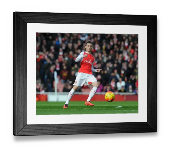 Framed Print : Laurent Koscielny (Arsenal). Arsenal 2: 1 Leicester City. Barclays Premier League