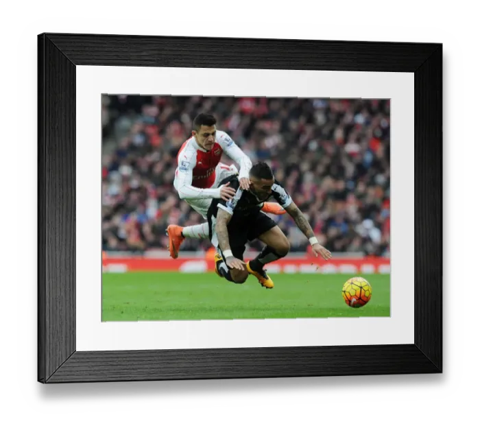 Framed Print : Intense Premier League Clash: Sanchez Fouls Simpson (Arsenal vs Leicester City, 2015-16) Framed Print : Intense Premier League Clash: Sanchez Fouls Simpson (Arsenal vs Leicester City, 2015-16)