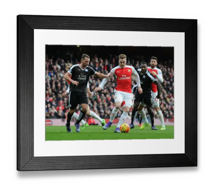 Framed Print : Calum Chambers Outsmarts Christian Fuchs: Arsenal's Premier League Triumph Framed Print : Calum Chambers Outsmarts Christian Fuchs: Arsenal's Premier League Triumph