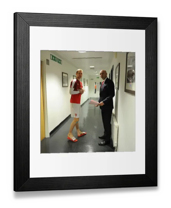 Framed Print : Per Mertesacker (Arsenal) with Assistant Manager Steve Bould before the match. Arsenal 0 Framed Print : Per Mertesacker (Arsenal) with Assistant Manager Steve Bould before the match. Arsenal 0
